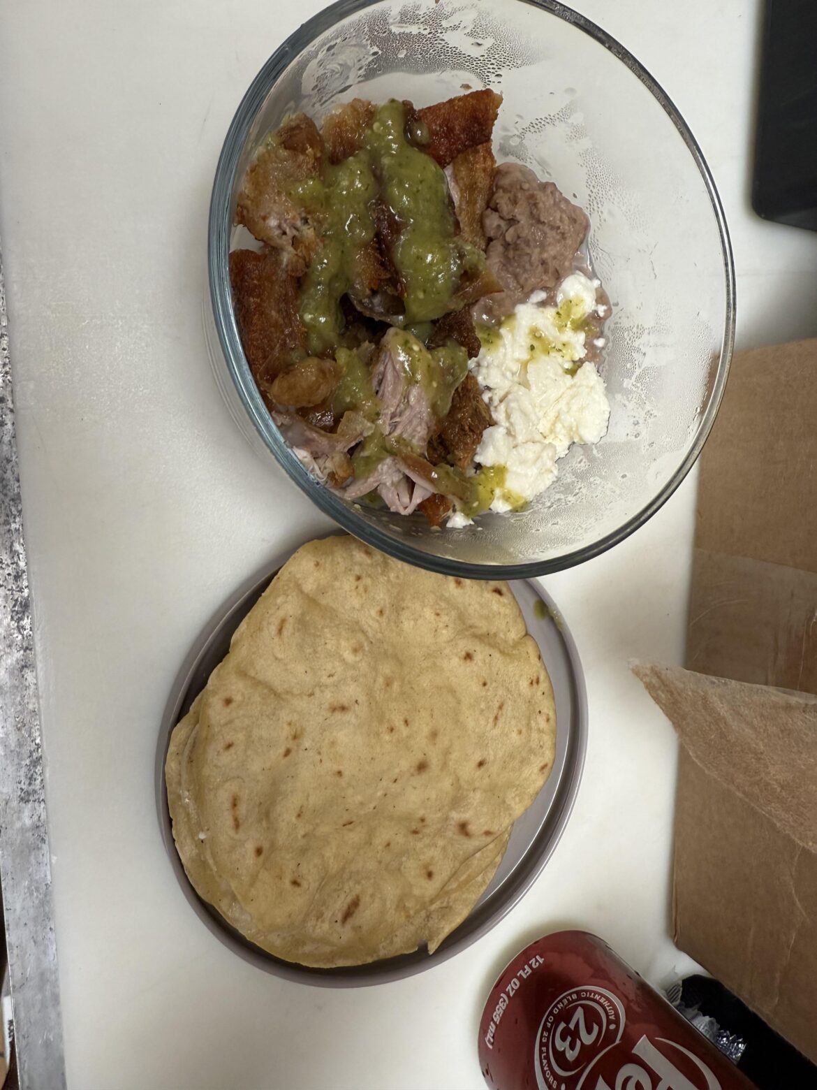 chicharron with frijoles salsa verde and queso fresco and homemade tortillas