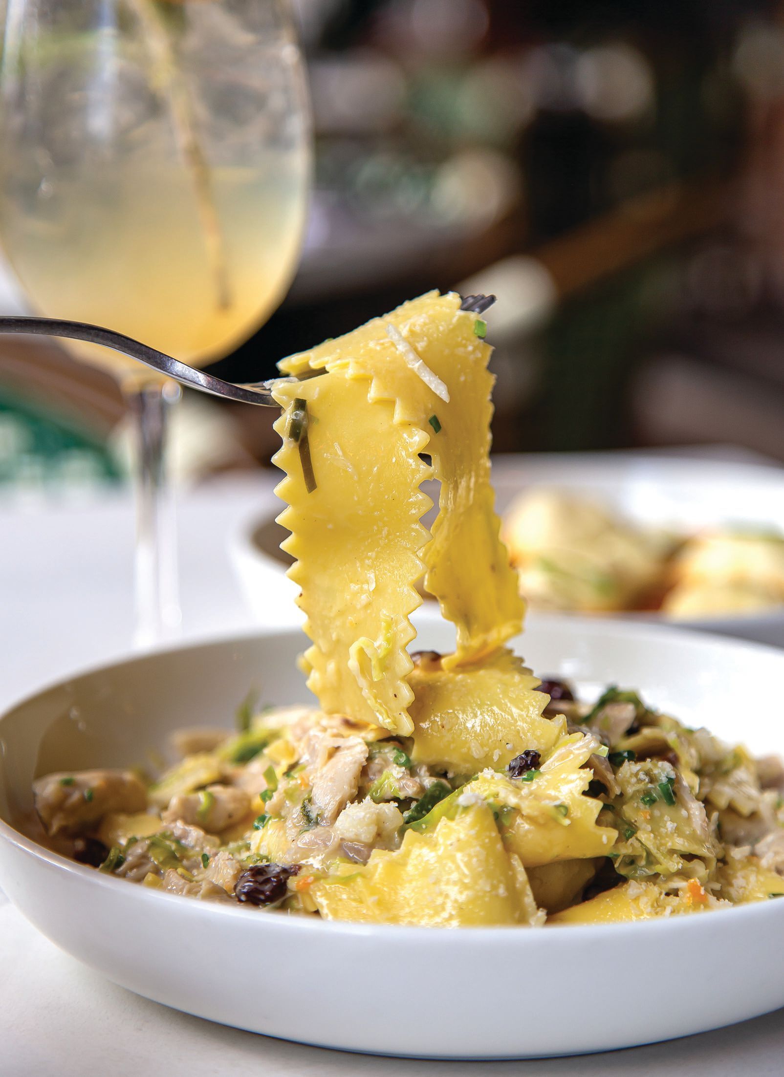 Indulge in delectable pasta dishes like fettuccini with white chicken ragu and rock shrimp mezzaluna at Rosalie. PHOTO BY FEARLESS RESTAURANTS