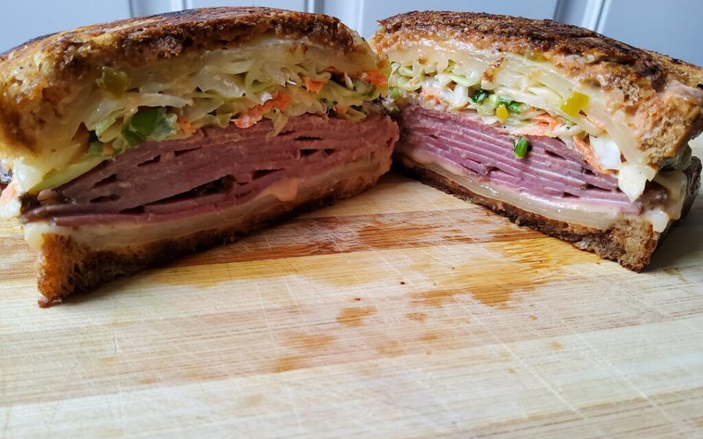 The Rachel melt. Pastrami, homemade coleslaw, Swiss cheese, and special sauce on Marble rye.