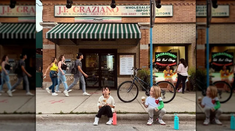 Kids sitting outside J.P. Graziano Grocery