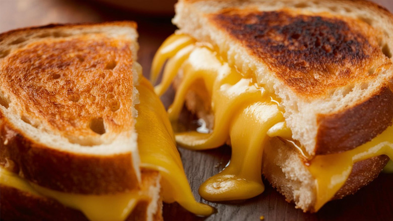 close up of gooey grilled cheese sandwich