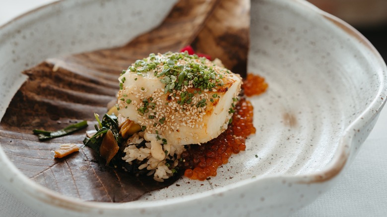miso-glazed black cod in a speckled bowl