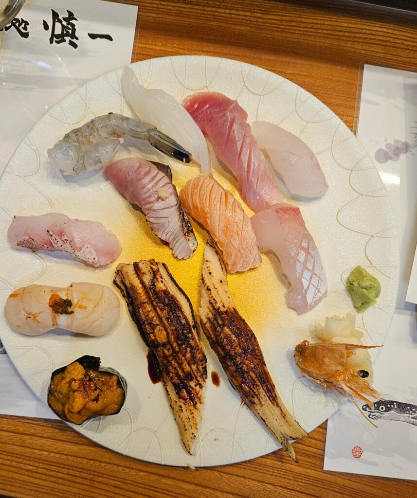 Omakase including conger eel sushi and sashimi. At Shinichi in Hitakatsu, on Tsushima island.
