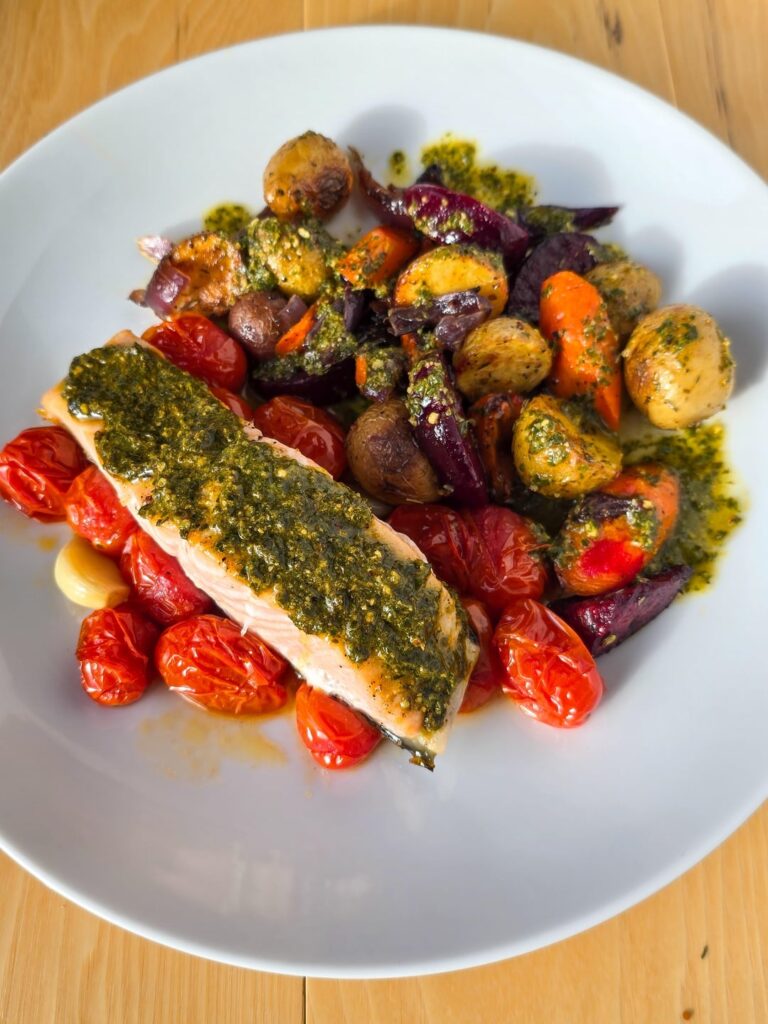 Salmon with pesto, roasted root vegetables