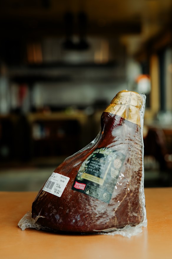 Woolworths Gold triple-smoked free-range bone in half leg ham.