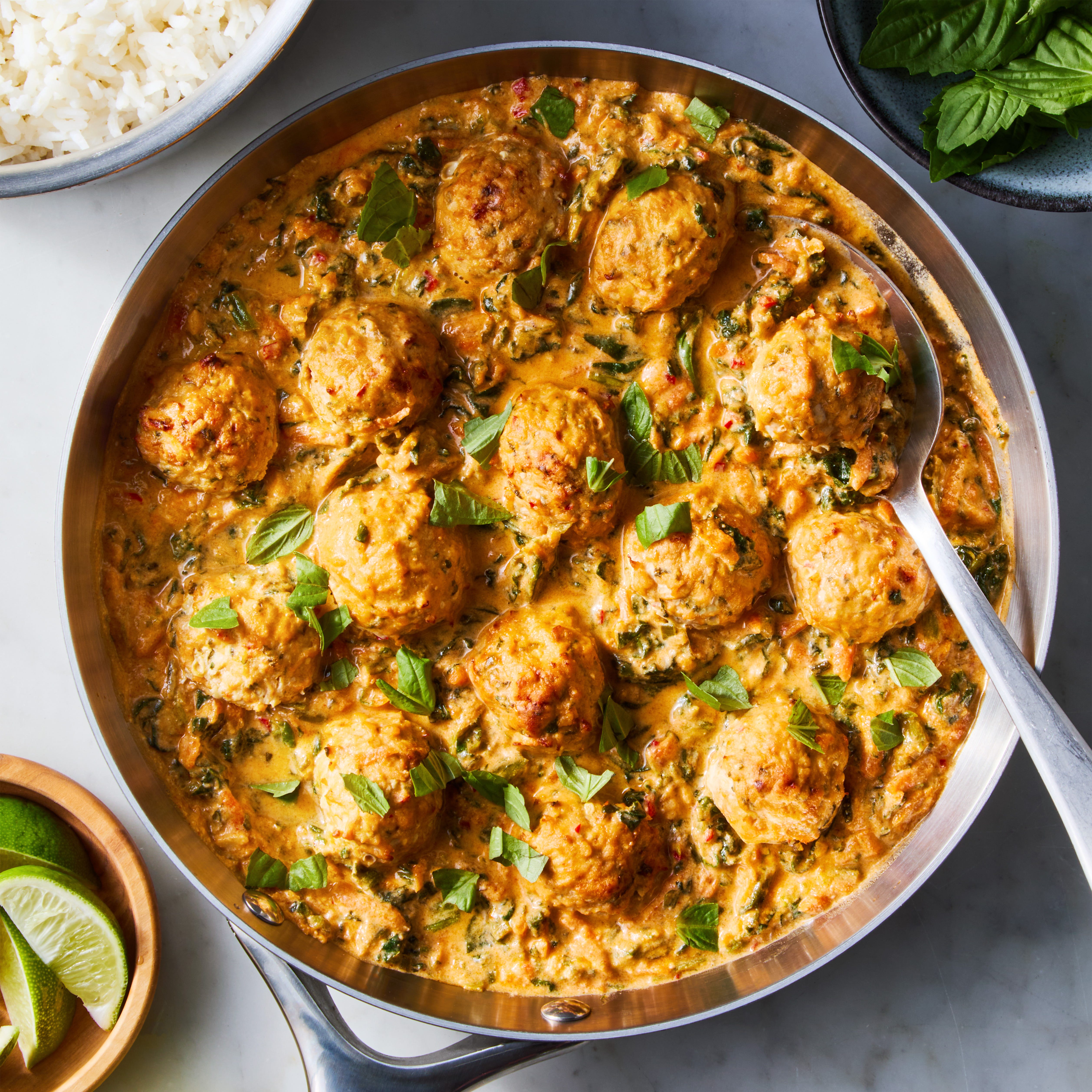 ginger, garlic, and scallion meatballs and a spicy red curry coconut sauce