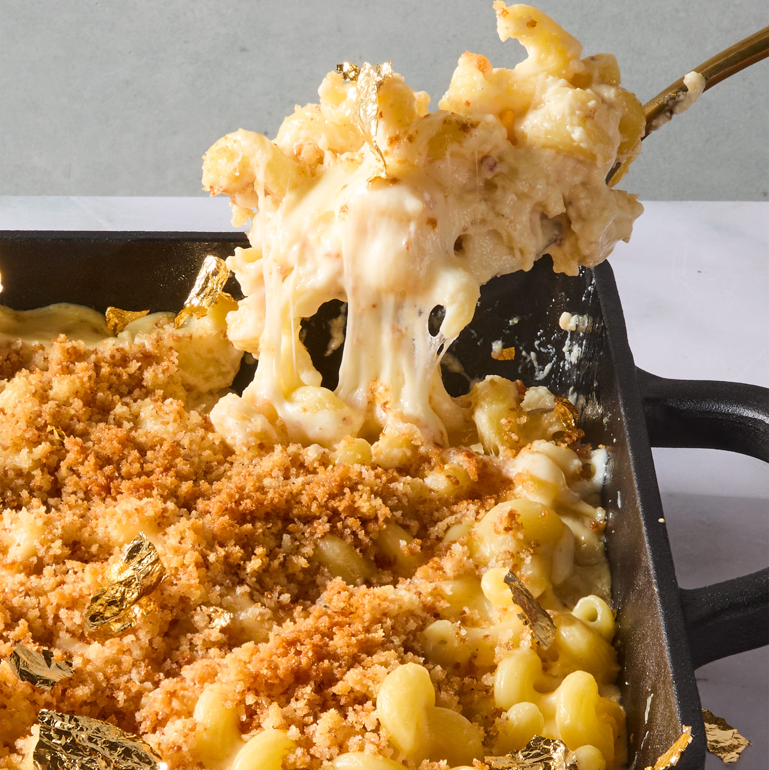 million dollar mac and cheese topped with crispy panko lifted from a pan