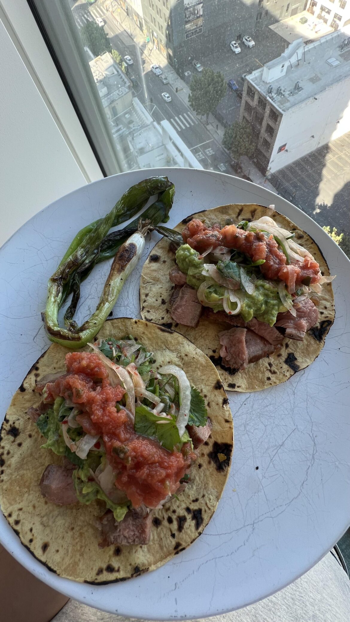 Steak tacos w guac +pickled onions