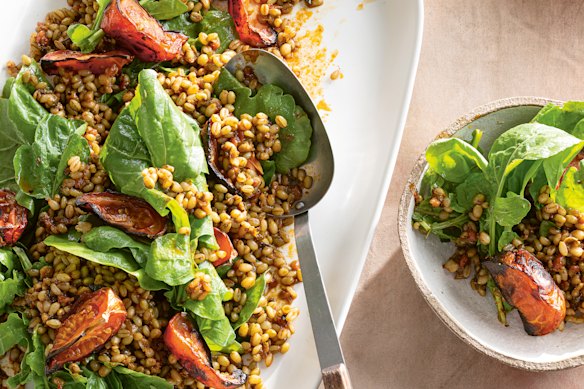 Freekeh, harissa, roasted tomato and rocket salad is delicious on its own or with steak.