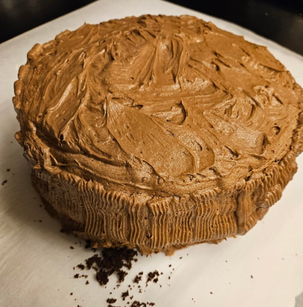 My first layer cake (two layers of devil's food cake with a cream cheese filling and a chocolate buttercream frosting)