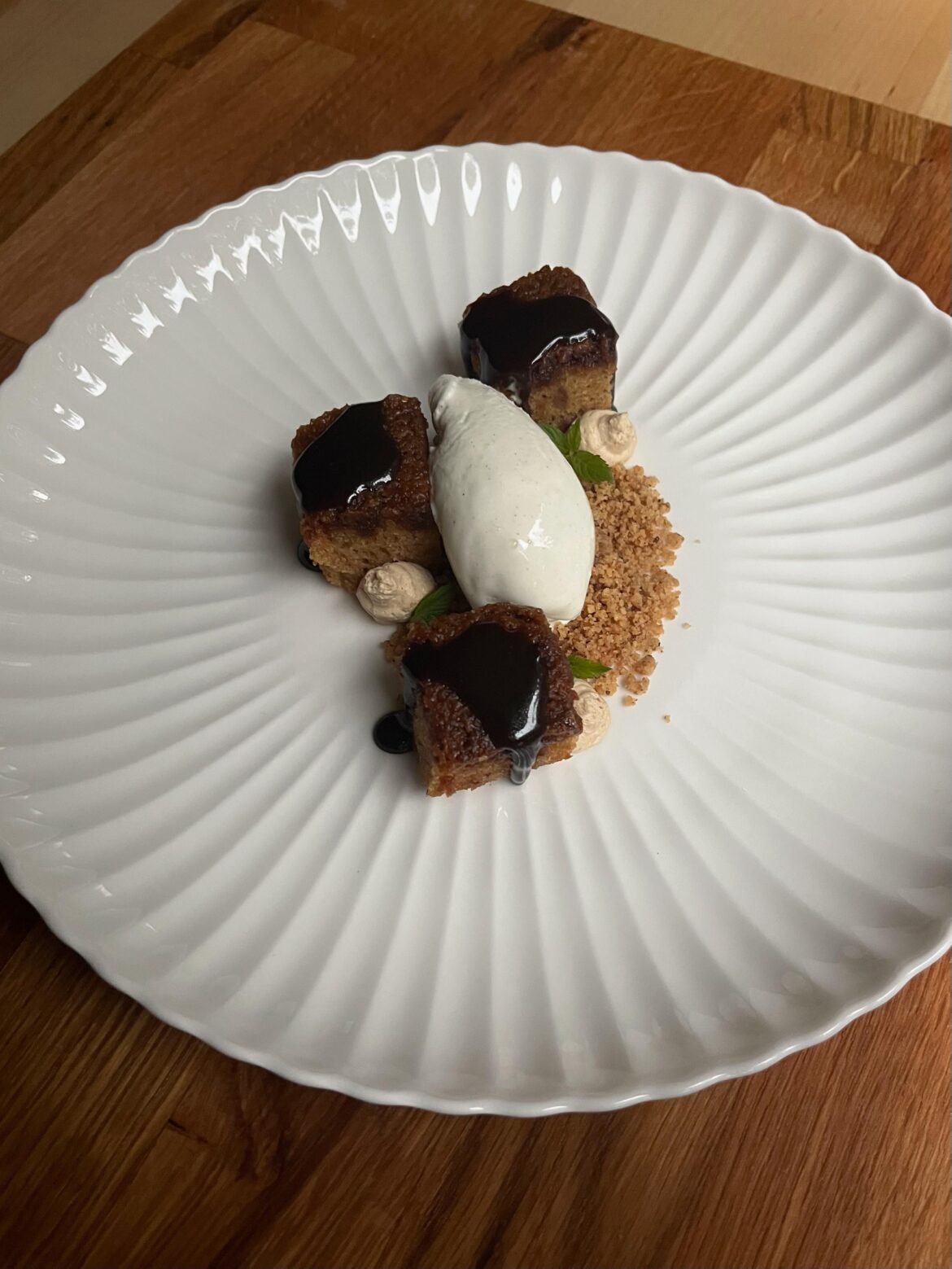Sticky date pudding, coconut-rum toffee, sour cream gelato, walnut crumble, carob chantilly