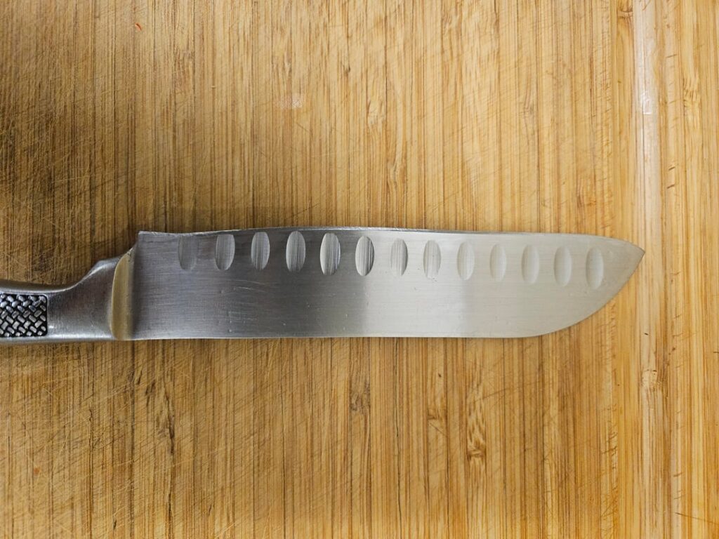 Someone absolutely butchered my favorite knife with the sharpener