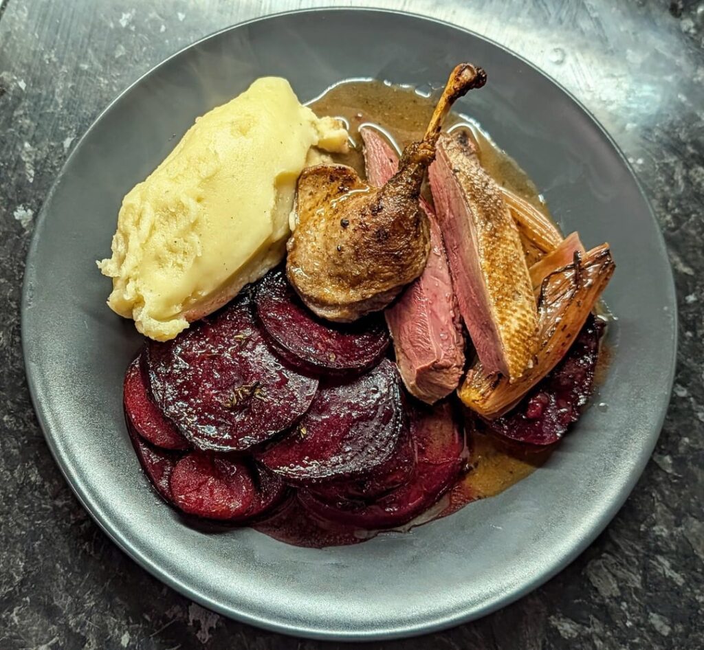 Mallard, baked beetroot and plums, clotted cream mash