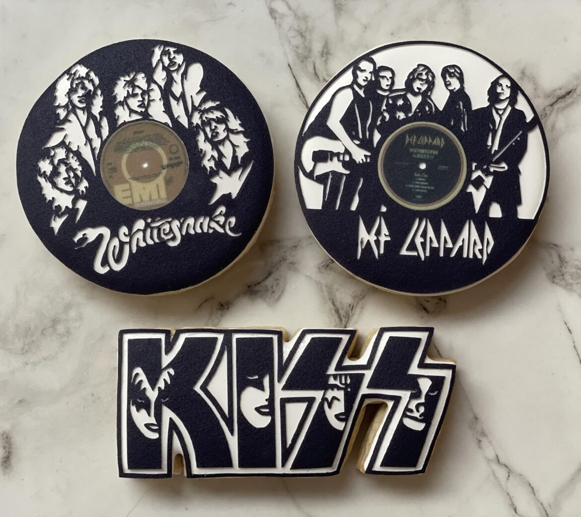 I tried a new technique and used my Cricut machine to cut icing sheets for a Rock & Roll themed cookie set! I'm so pleased with the result!