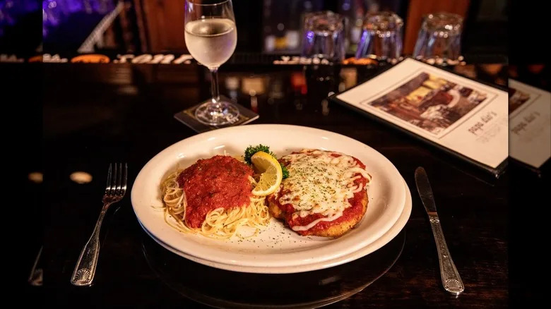 Chicken parmesan and spaghetti with marinara sauce
