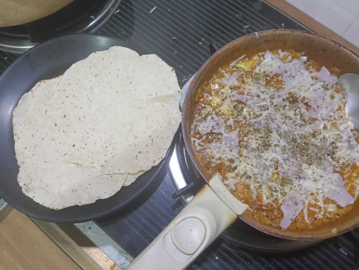 Menemen with some ham homemade flatbread and scamorza cheese