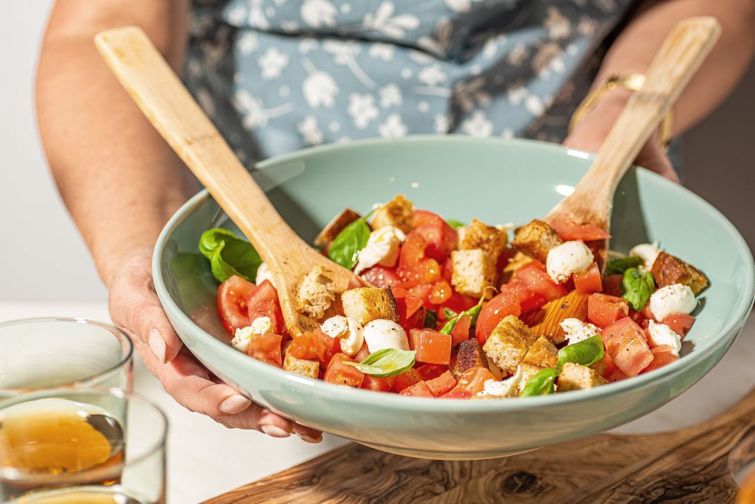 Tossed with tomatoes, basil, onions and olive oil, panzanella is a bread salad created by softening stale bread with water and/or vinegar.