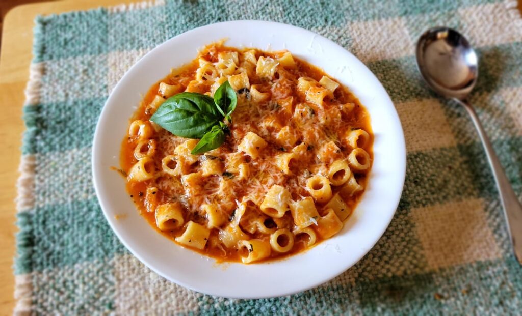 Tomato basil pasta, cooked risotto-style right in the sauce. Perfect comfort for a chilly day.