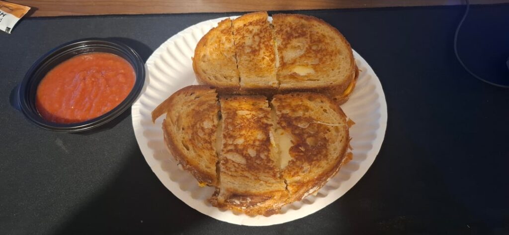 Pepperjack, muenster, and American on 'bistro bread' with smooth salsa