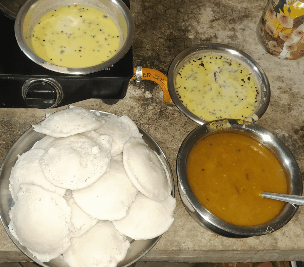 I travelled to my aunt's place and here early in the morning some person was selling piping hot "idli sambar chutney" on his bicycle. Sharing it's glimpses