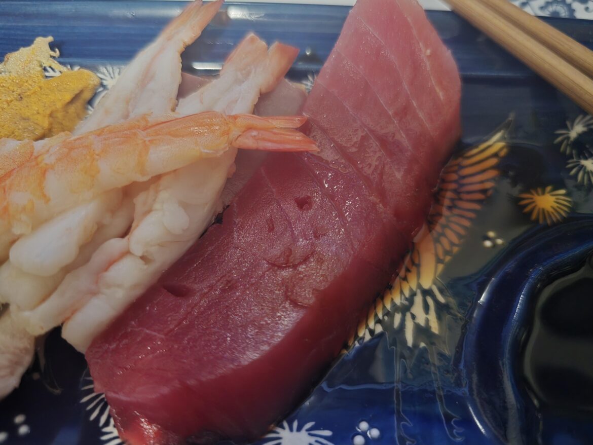 My tuna sashimi was oddly happy to see me
