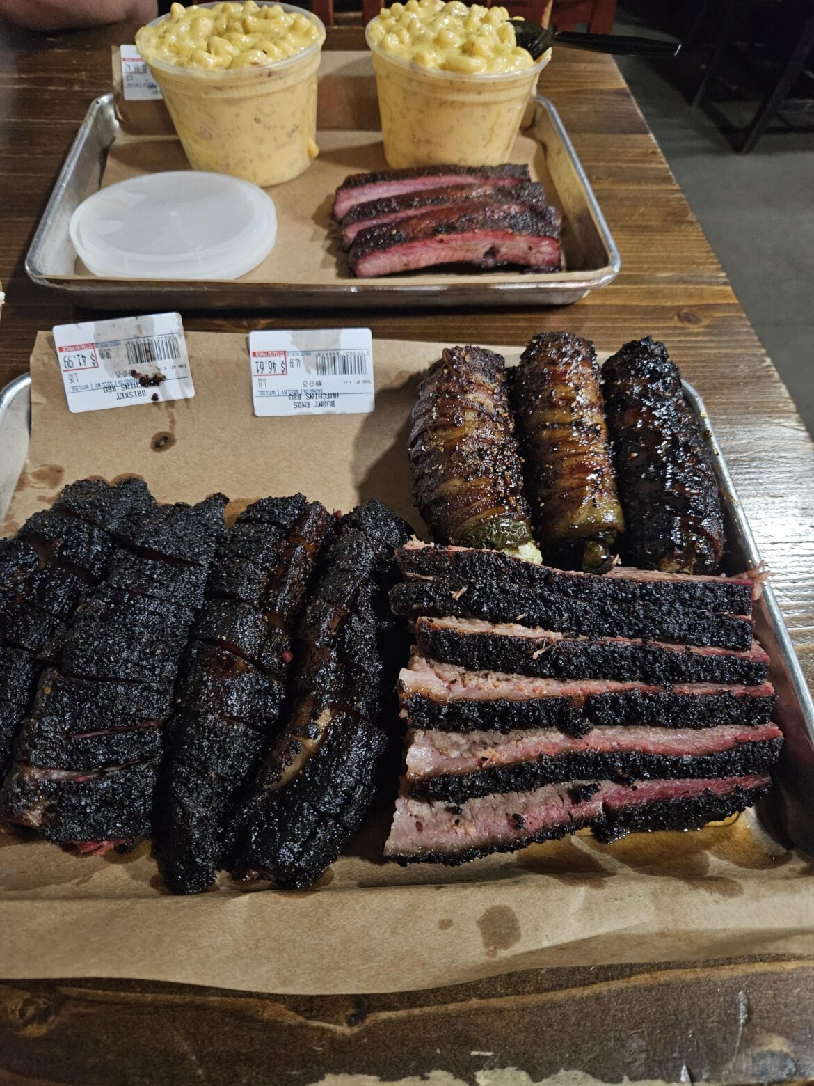 Went back to hutchins because it was my favorite in Dallas. Learned that beef ribs are not worth the price. 1 pound moist brisket, 1 pound brisket burnt ends, half pound pork ribs, 3 texas Twinkies, 2 pints Mac and cheese. Enough food for 4 easy at 155 $. Free peach cobbler and Banana as well.