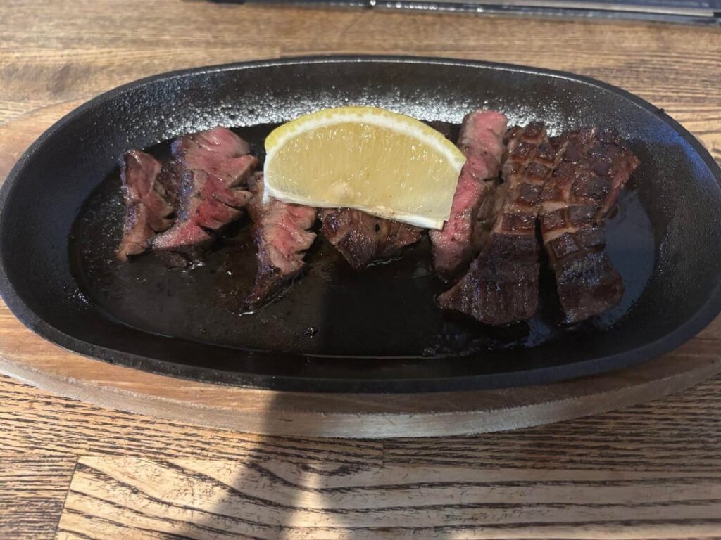 Beef tongue steak and pork belly-wrapped skewers from Hakata Izakaya HERO