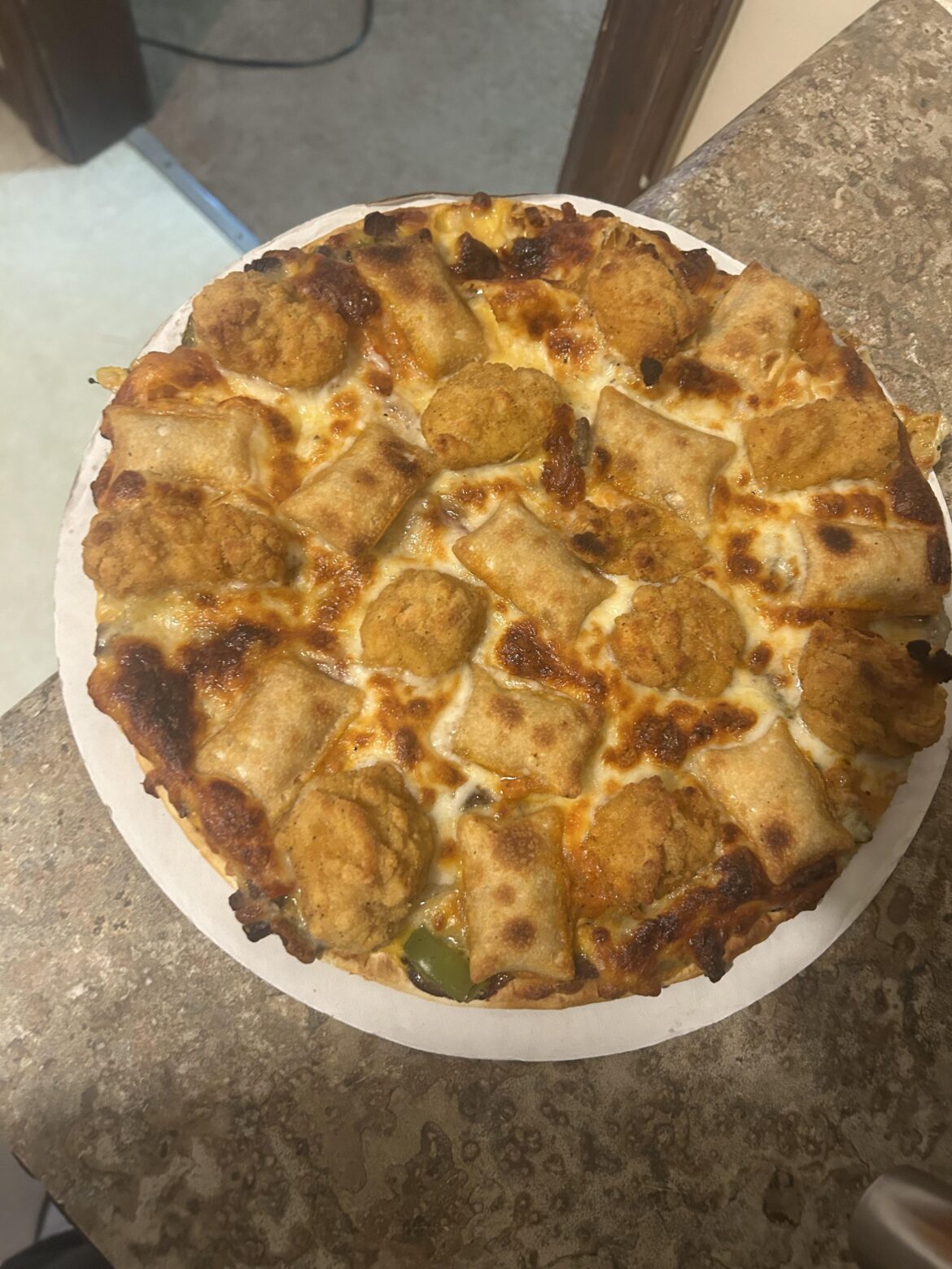 Pizza roll, popcorn chicken, Philly cheesesteak pizza