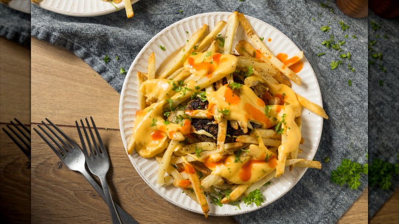 Homemade Beef Horseshoe Sandwich with Toast Fries and Cheese Sauce