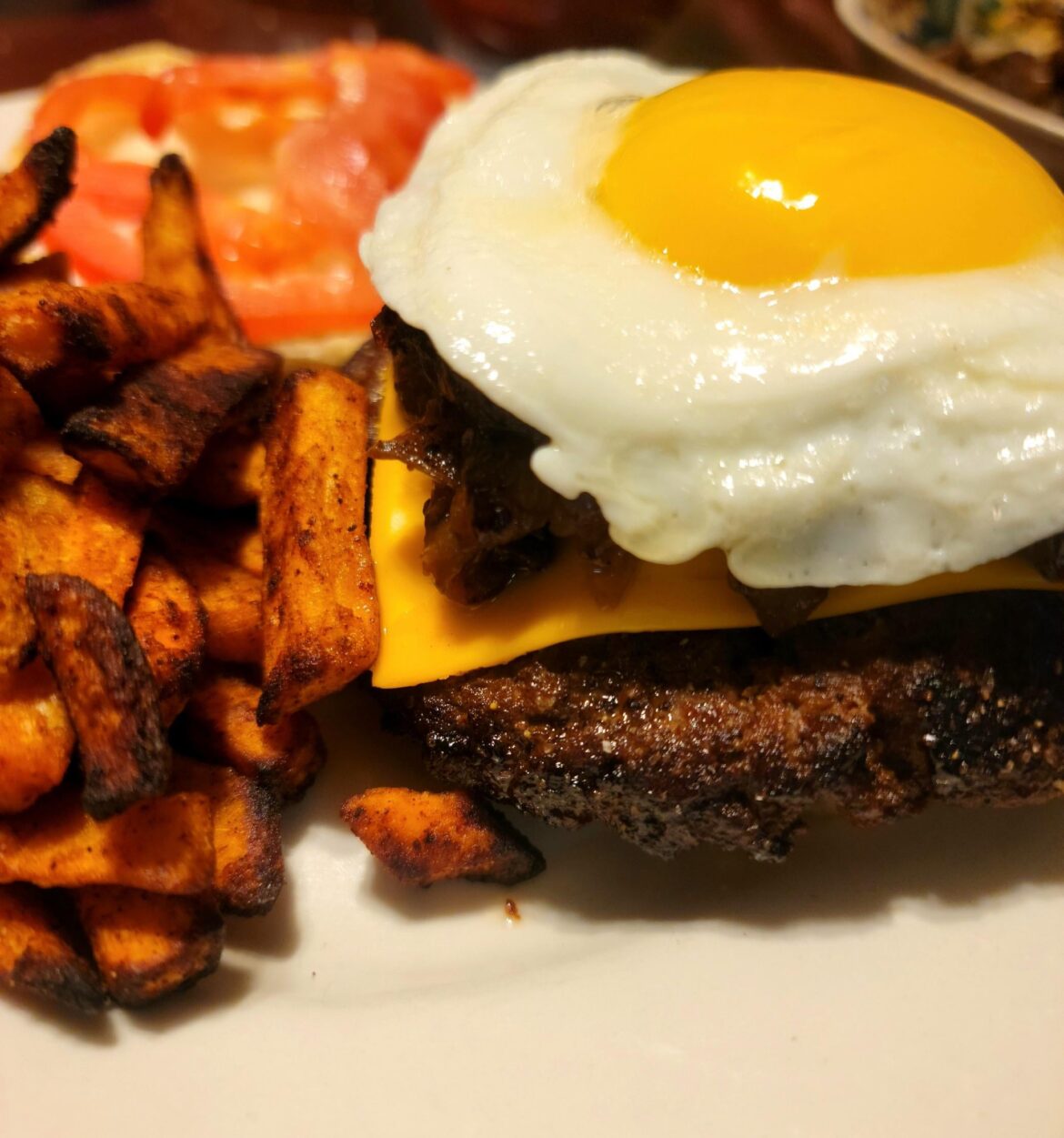 The perfect sunnyside up egg on a cheeseburger hits just right...especially when the yolk drips down on your fingers when you take a bite!