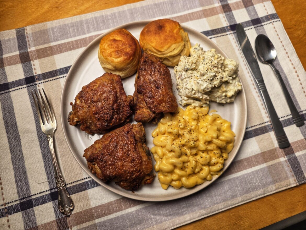 Cornell chicken thighs, mac and cheese from a box, potato salad, Pillsbury biscuits