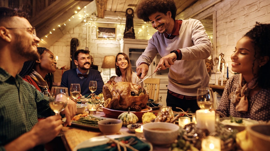 Man carving a turkey