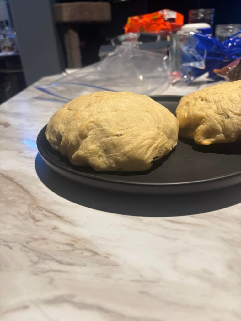 First attempt at making bread. Why is she so sad-looking? First attempt at making bread. Why is she so sad-looking?