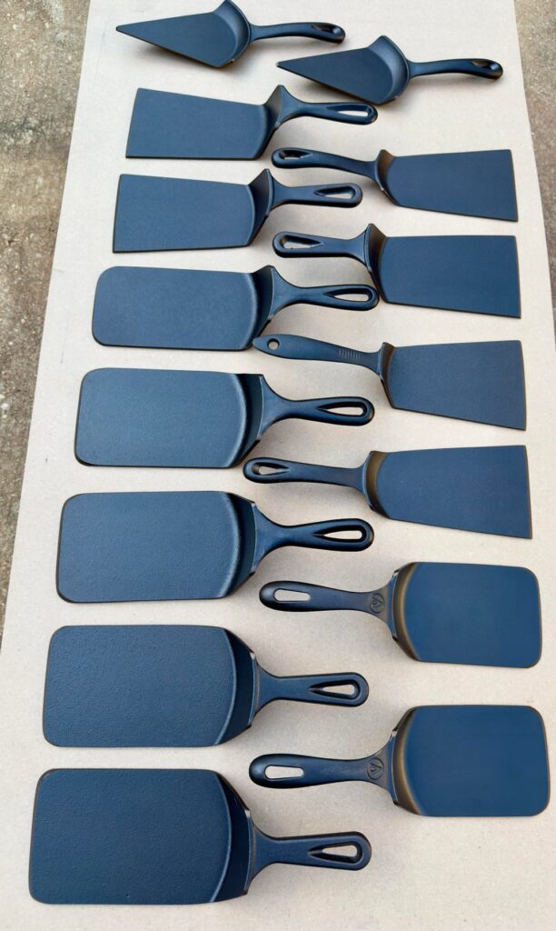 Spatulas I made from mostly damaged cast iron skillets.