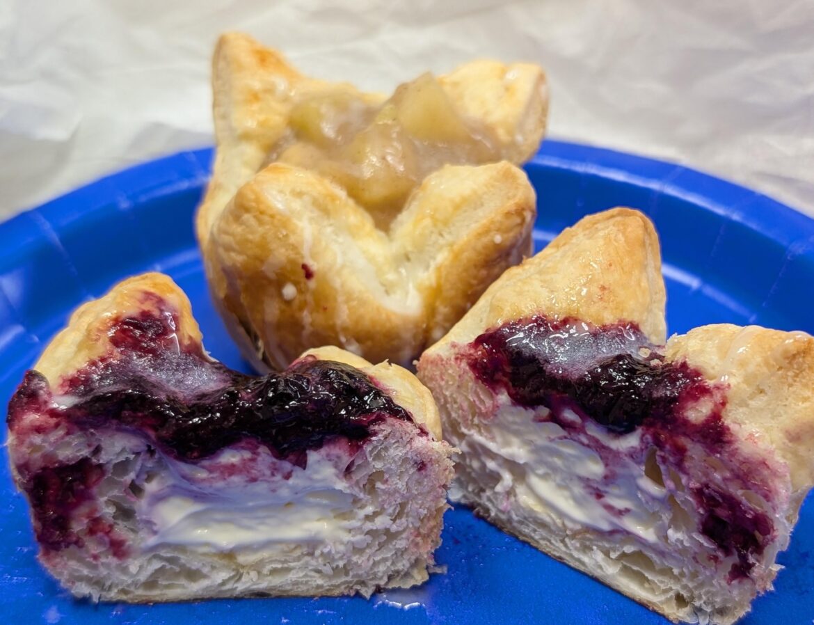 Puff pastry filled with a cheesecake filling and blueberry or apple pie topping (Homemade)