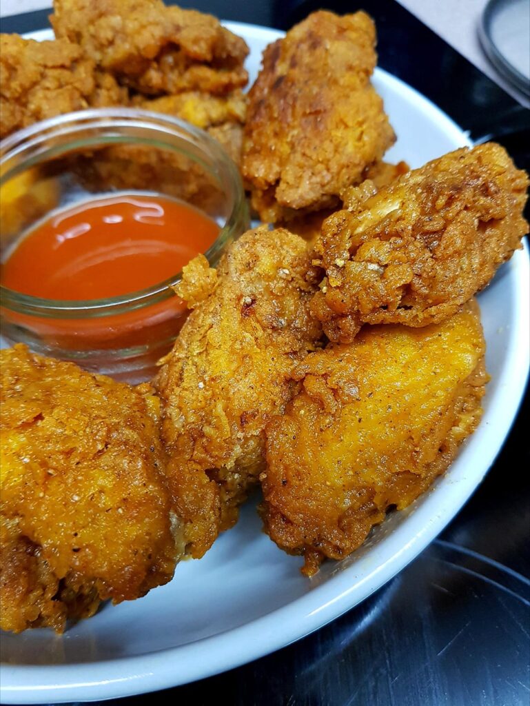 KFC Style Hot Wings, Fries, Corn and Slaw. Frank's Hot Sauce, Cause it's the Sh*t 💁🏼‍♀️