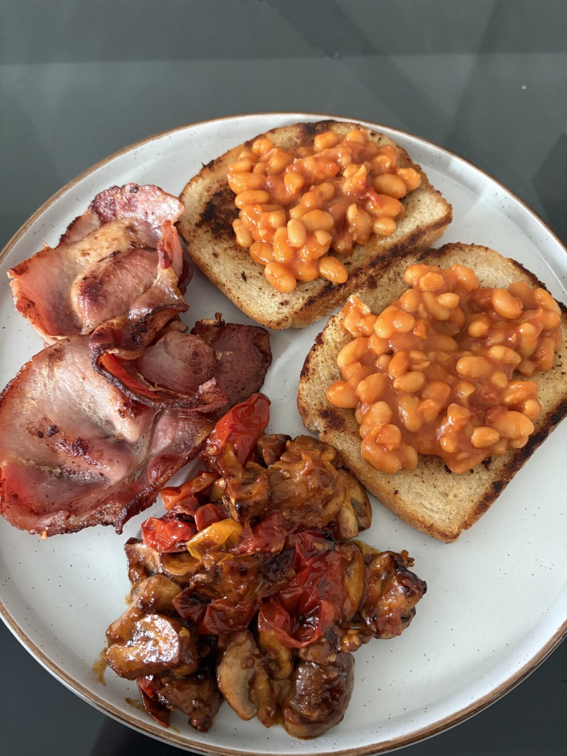 Beans on toast, 3x bacon, creamy mushroom tomato thing