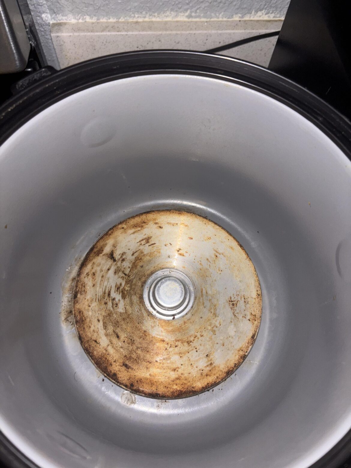 Question on how to clean a slow cooker heating element?