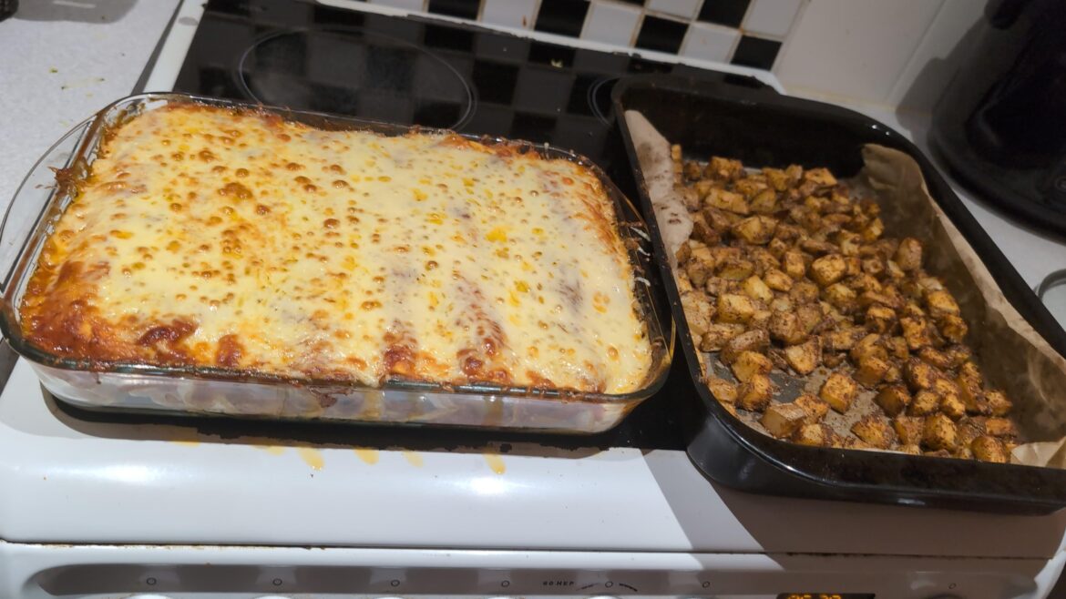 Homemade enchiladas and spiced potatoes