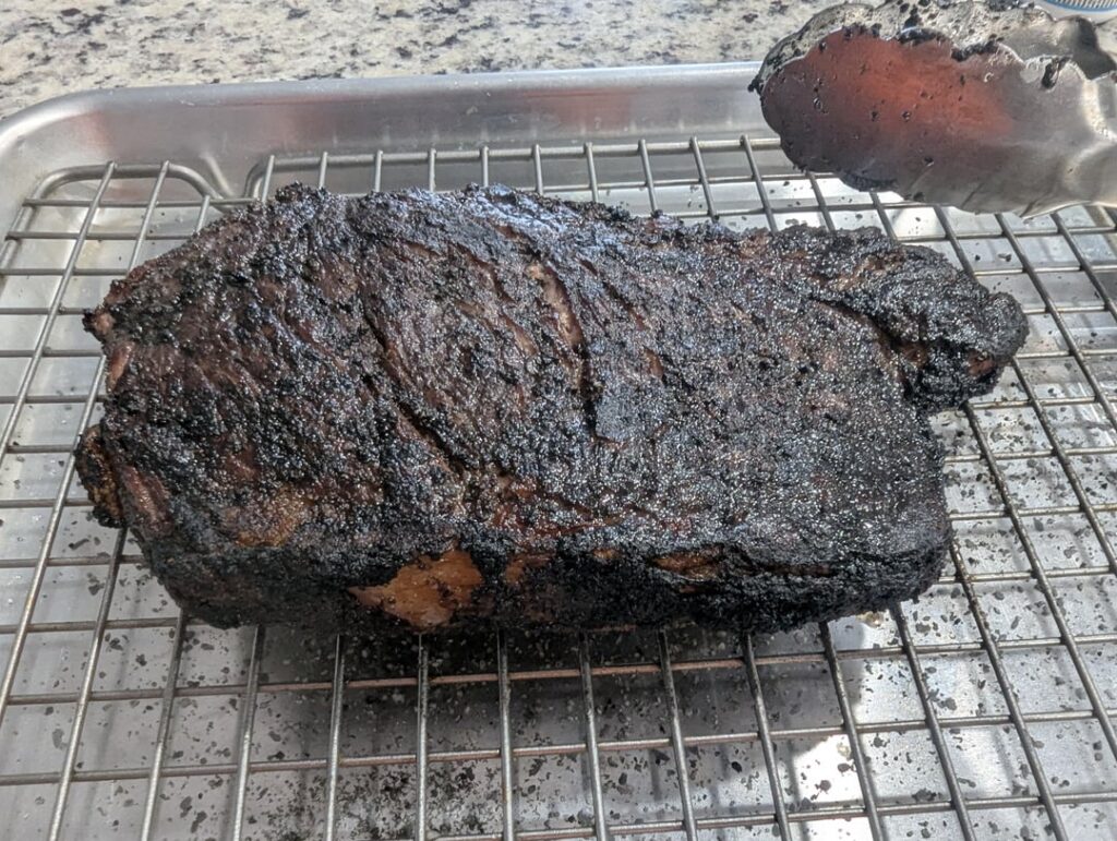Hickory wood flame seared bone in NY strip