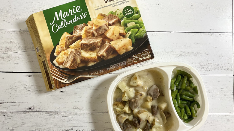 The box and tray of Marie Callender's Garlic Butter Steak Bites