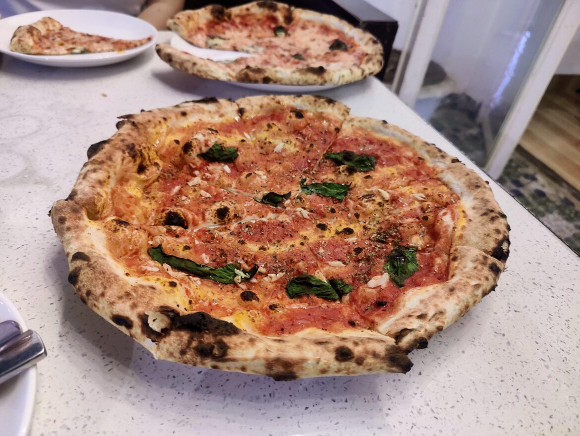 I <3 a good wood-fired, thin crust, san marzano/basil/olive oil/chili oil/sliced garlic + cheeseless! marinara - da nang, vietnam