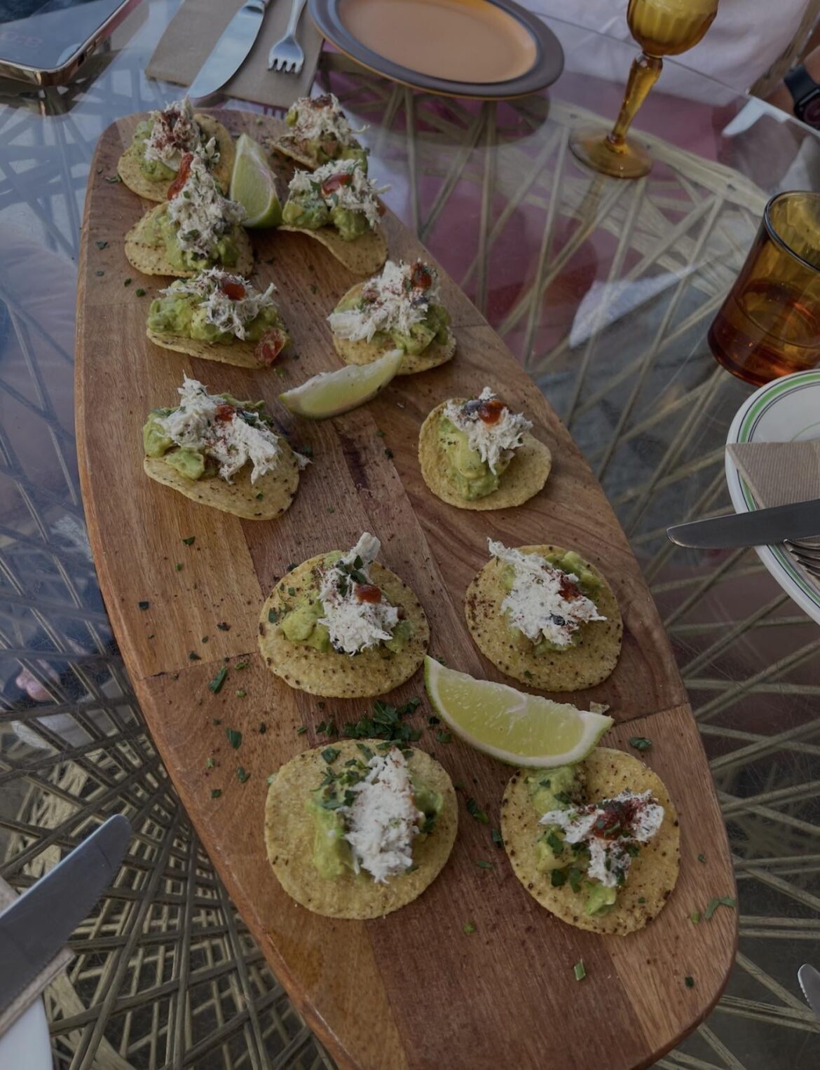 “nachos” served on the mini wooden surfboard