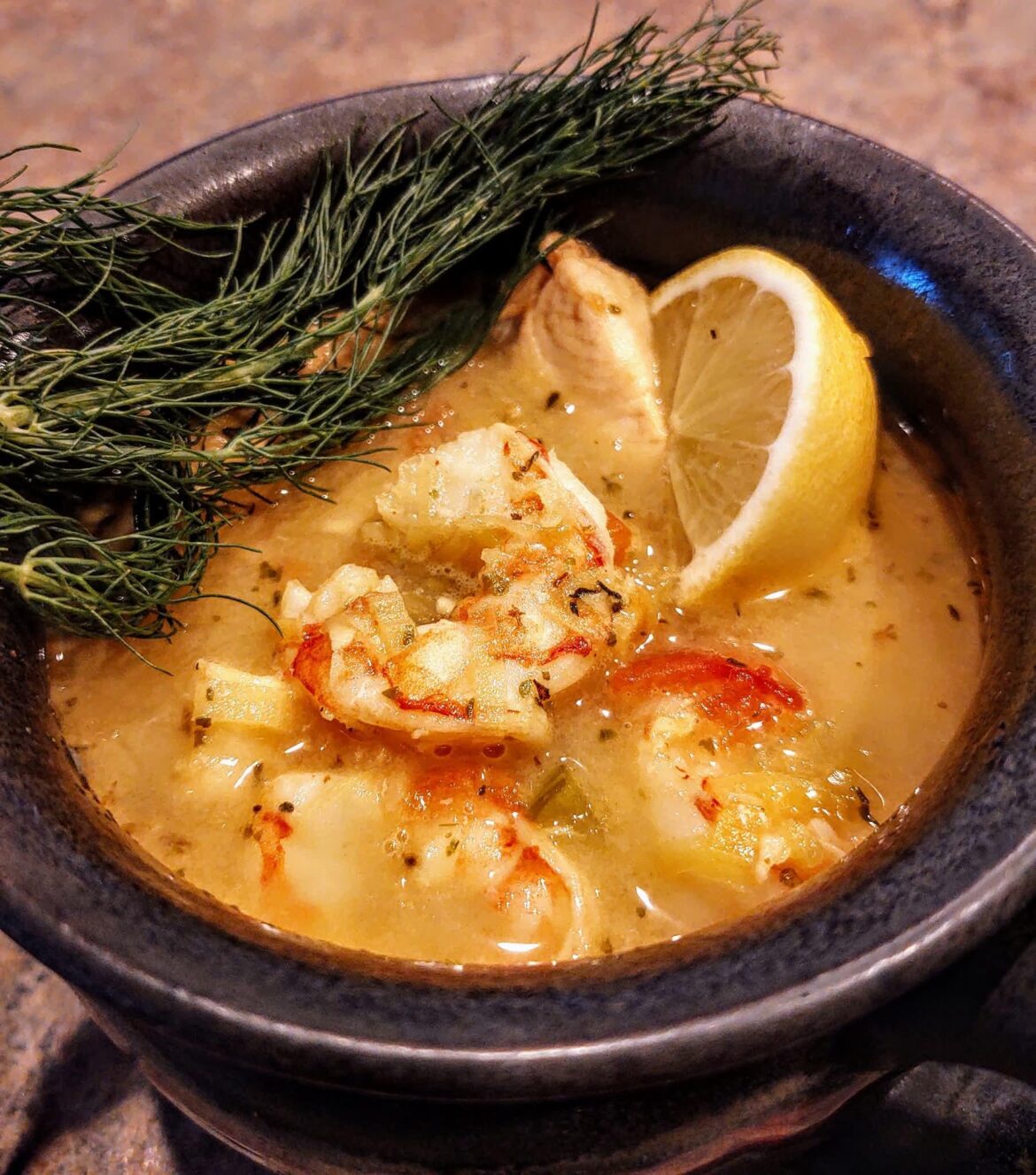 Homemade boulliabaisse on a cold rocky mountain evening.