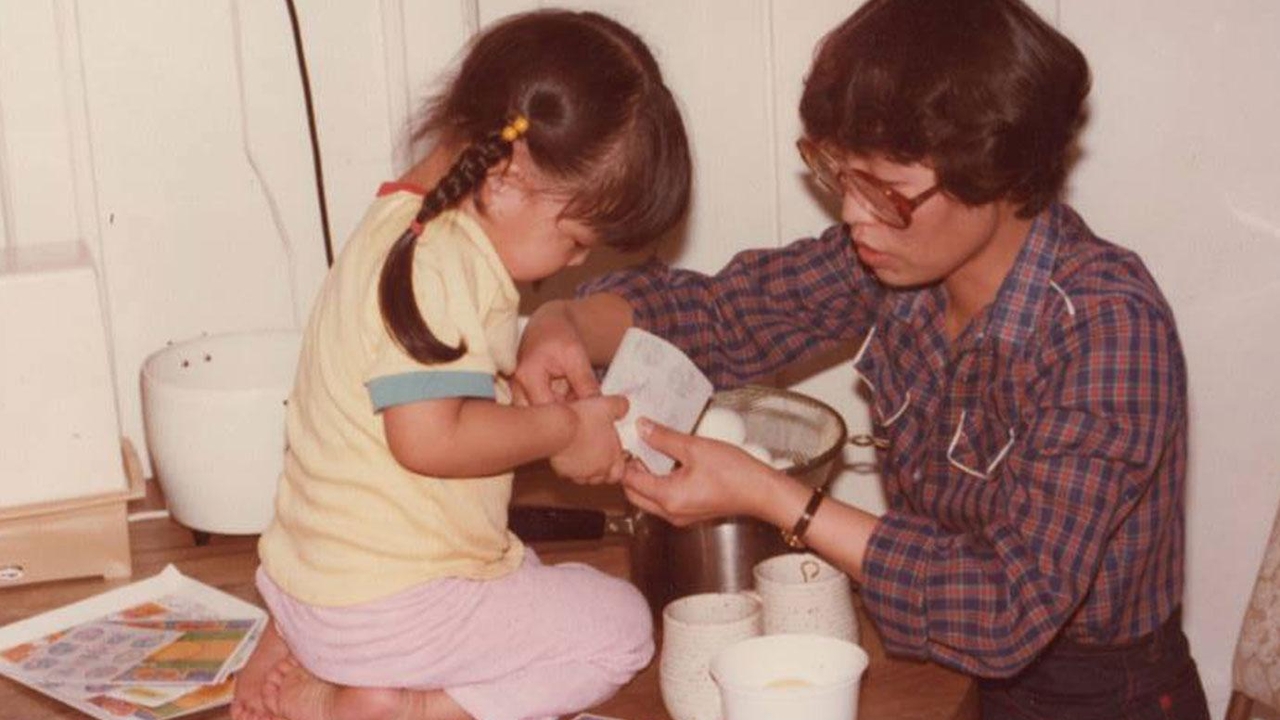 A childhood photo of Molinaro playing with her mother.  Her parents fled North Korea as children with their families and later immigrated to the United States in the 1970s. (Joanne Lee Molinaro)