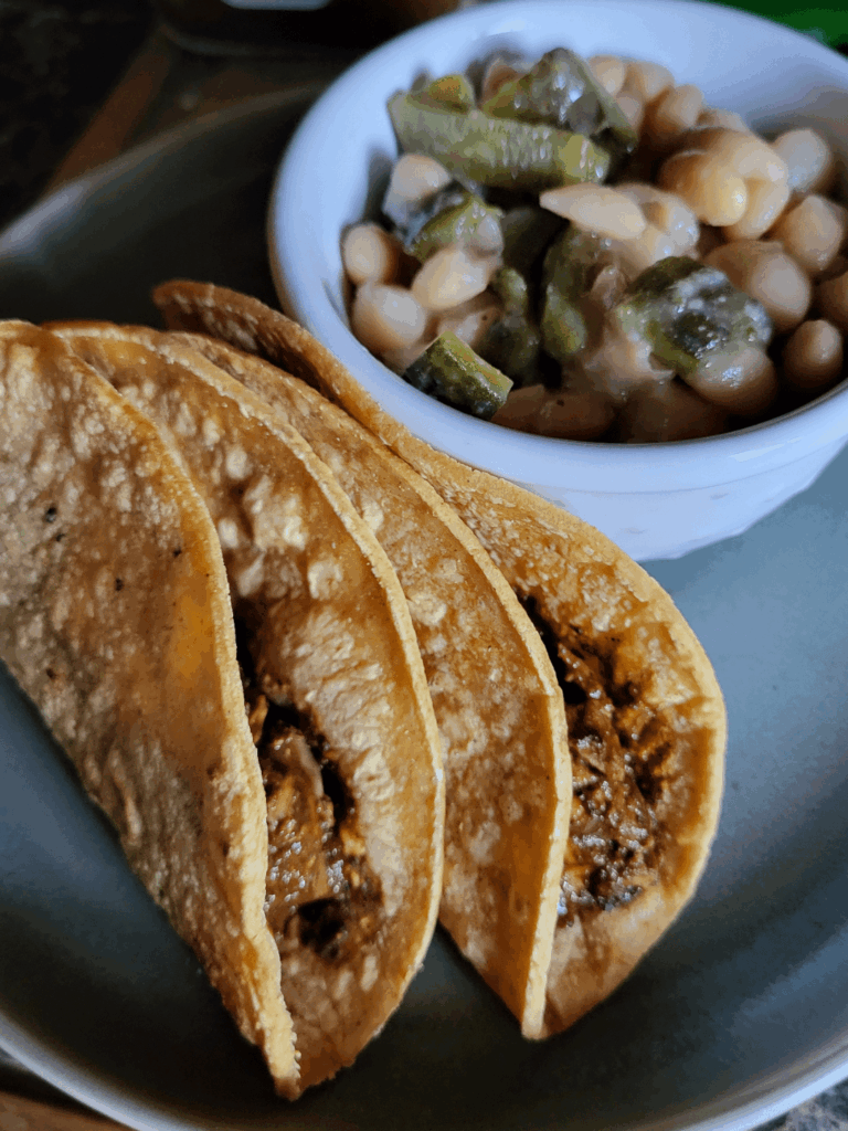 I love adding coocked rajas de poblano in my frijoles.