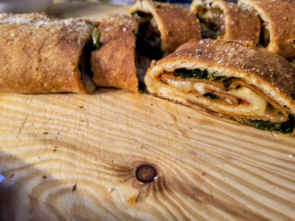 Through this together quickly last minute, and absolutely fell in love with it. Pillsbury dough, Daiya mozzarella shreds, Field roast balsamic mushroom deli slices, spinach and sauce. Follow your heart parmesan sprinkled on top