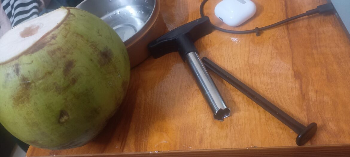 Is there any hack to open a coconut and get the water without spilling any of it?