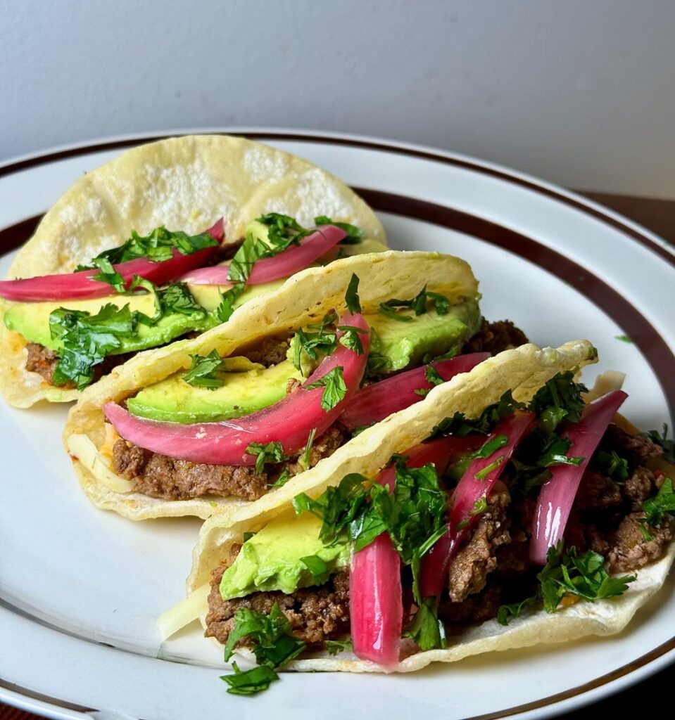 Taco night - ground/seasoned beef, queso Chihuahua, pickled red onions, cilantro, avo, Secret Aaardvark, corn torts