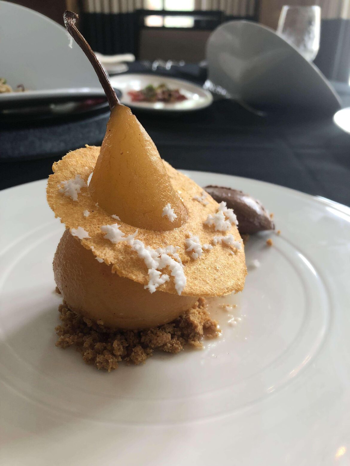 Spiced vanilla poached Bosc pear